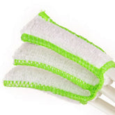 Person holding a Double Head Cleaning Brush for effective dusting in a car interior.