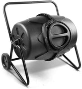 Person adding kitchen waste into a Removable Rotary Compost Bucket for efficient composting in a garden.
